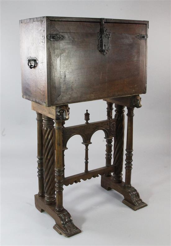 An 18th century and later Spanish walnut and iron mounted vargueno on stand, W.3ft 2in. H.4ft 9.5in.